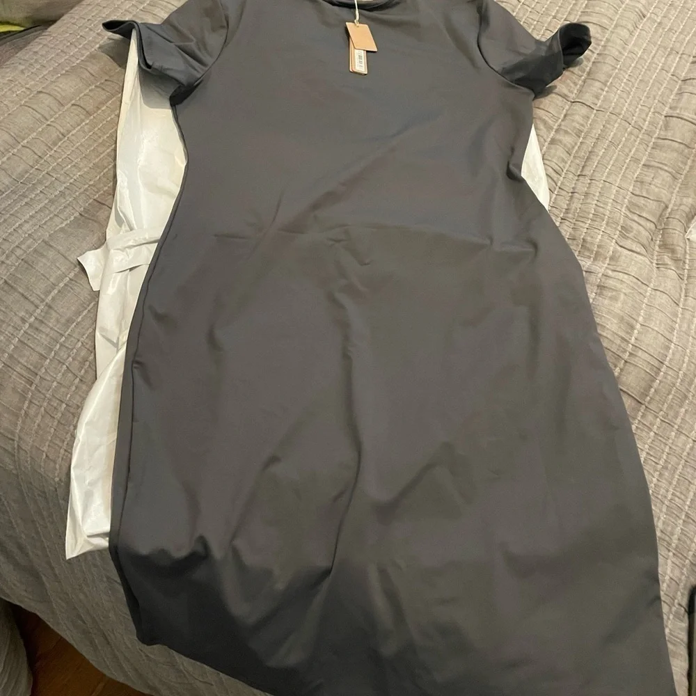 Skims recycled swim dress.